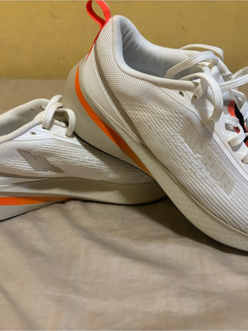 Men's White Athletic Running Shoes with Orange Accent